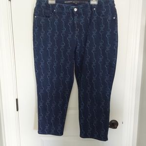 Chico's crop denim. Riding buckle print. ~22.5" inseam. Darker blue.